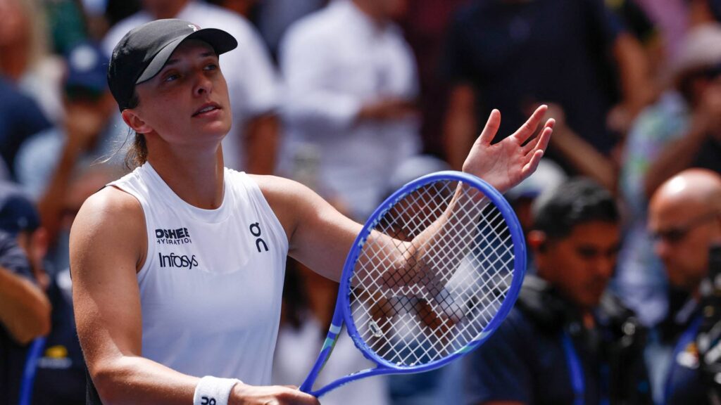 Swiaktek comemorando a vitória na 2ª rodada do US Open. Foto: Kena Betancur / AFP